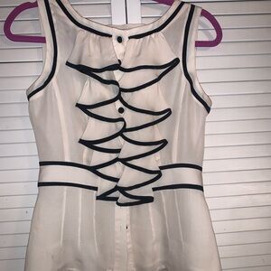 Elegant White Sleeveless Top with Black Trim